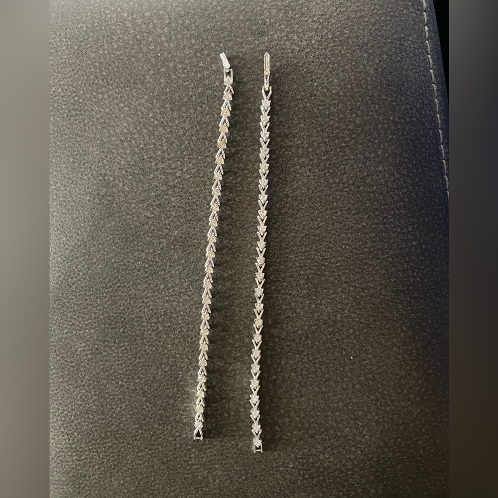 Two silver bracelets.